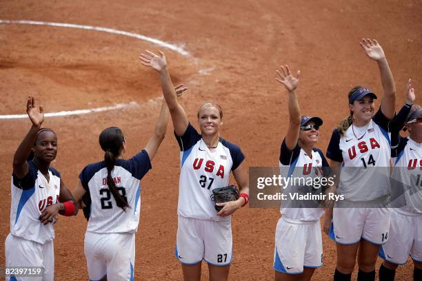 Natasha Watley, Andrea Duran, Jennie Finch, Jessica Mendoza and Monica Abbott of the United States wave to the crowd after winning 9-0 over China in...