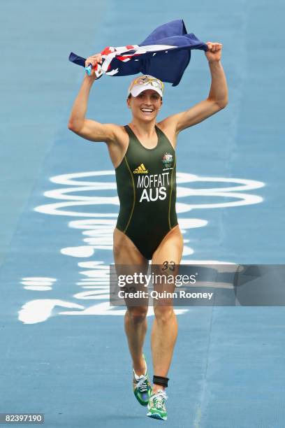 Bronze medalist Emma Moffatt of Australia celebrates after the women's triathlon event at the Triathlon Venue on Day 10 of the Beijing 2008 Olympic...