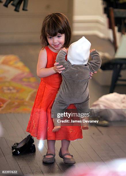 Suri Cruise visits Bonpoint children store in West Village on August 17, 2008 in New York City.