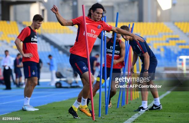 Paris Saint-Germain's Uruguayan forward Edinson Cavani takes part in a training session at the Grand Stade in Tangiers on July 28, 2017 on the eve of...