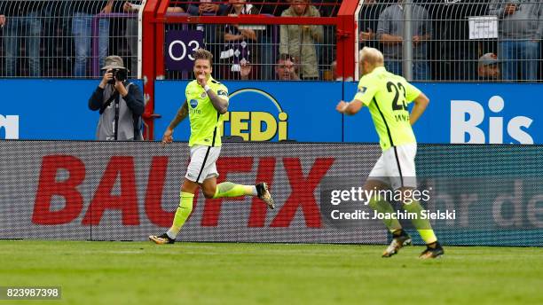 Manuel Schaeffler and Alf Mintzel of Wehen Wiesbaden celebration the goal 0:1 for Wehen Wiesbaden during the 3. Liga match between VfL Osnabrueck and...