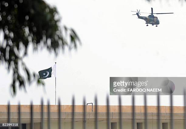 An army helicopter carrying Pakistani President Pervez Musharraf, leaves the presidency after his resignation in Islamabad on August 18, 2008....