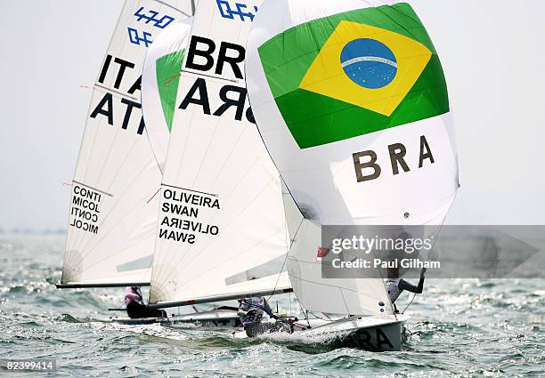 Fernanda Oliveira and Isabel Swan of Brazil compete in the Women's 470 class medal race held at the Qingdao Olympic Sailing Center during day 10 of...