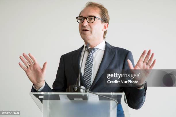 German Transport Minister Alexander Dobrindt is pictured during a news conference regarding the future opening of the high speed connection Berlin -...