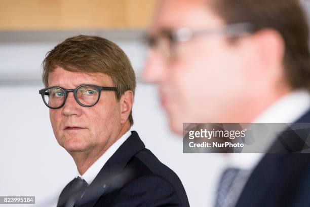 German Transport Minister Alexander Dobrindt and Deutsche Bahn Infrastructure Manager Ronald Pofalla are pictured during a news conference regarding...