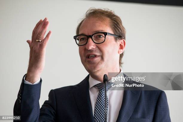 German Transport Minister Alexander Dobrindt is pictured during a news conference regarding the future opening of the high speed connection Berlin -...