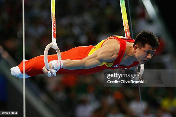 Chen Yibing of China competes in the men's ring final during the artistic gymnastics at the National Indoor Stadium event on Day 10 of the Beijing...