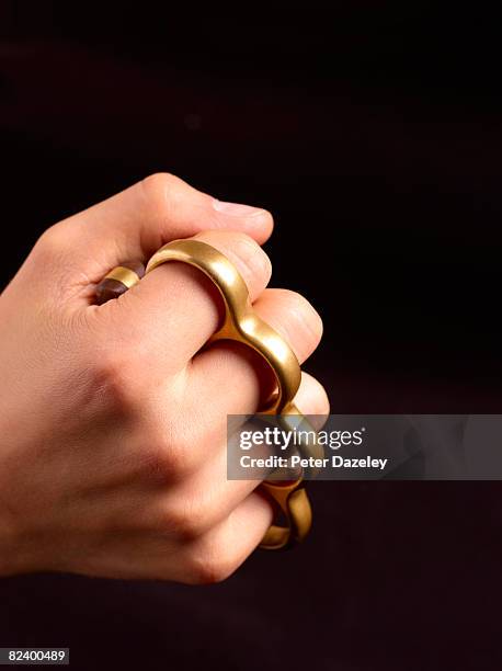 63 Hand Brass Knuckles Stock Photos, High-Res Pictures, and Images - Getty  Images