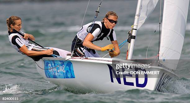 Sailors Marcelien de Koning and Lobke Berkhout of the Netherlands turn a mark during the 470 women's class event of the 2008 Beijing Olympic Games...