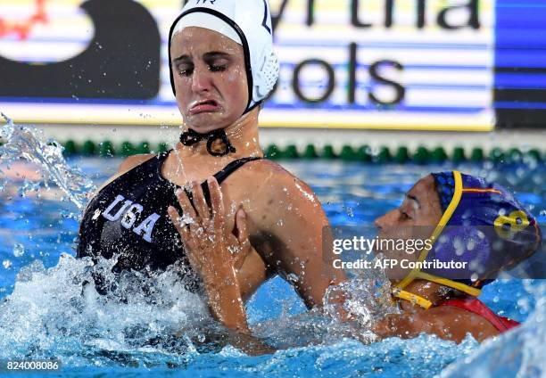 Captain Maria del Pilar Pena Carrasco of Spain fights for the ball with US Kiley Neushul in 'Hajos Alfred' swimming pool of Budapest on July 28, 2017...