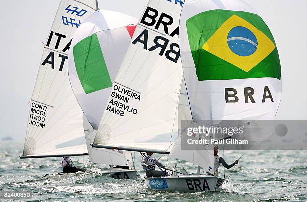 Fernanda Oliveira and Isabel Swan of Brazil compete in the Women's 470 class medal race held at the Qingdao Olympic Sailing Center during day 10 of...