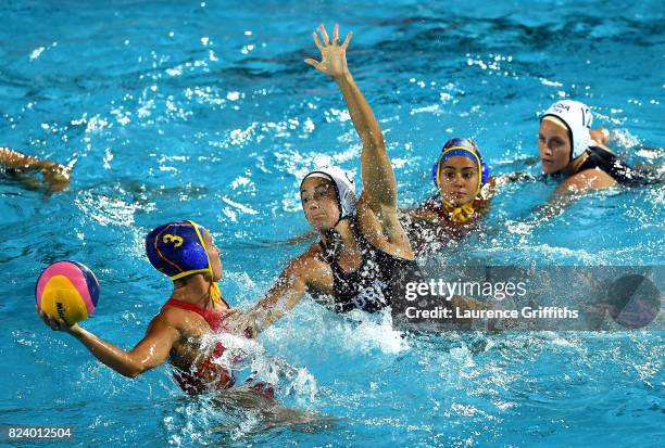 Margaret Steffens of United States defends against Anna Espar Llaquet of Spain during the Women's Water Polo gold medal match between the United...