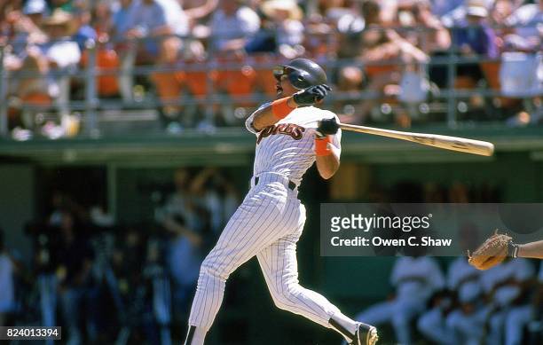 Benito Santiago of the San Diego Padres bats at Jack Murphy Stadium circa 1986 in San Diego, California.