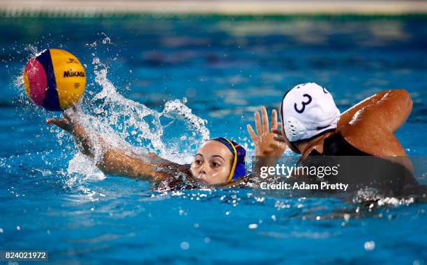 Beatriz Ortiz Munoz of Spain is challenged by Melissa Seidemann of United States during the Women's Water Polo gold medal match between the United...