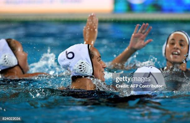 Players celebrate their victory over Spain in 'Hajos Alfred' swimming pool of Budapest on July 28, 2017 after the woman final of FINA2017 world...