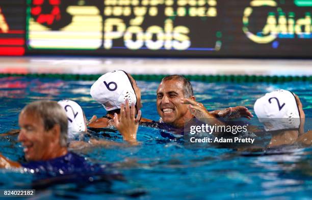 Head coach Adam Krikorian of the United States celebrates with Margaret Steffens of United States following their team's 13-6 victory during the...