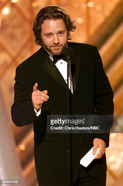 Russell Crowe accepts the award for Best Actor in a Motion Picture Drama for his role in "A Beautiful Mind" during the 59th Annual Golden Globe...