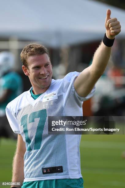 Quarterback Ryan Tannehill of the Miami Dolphins gives thumbs up during training camp on July 27, 2017 at the Miami Dolphins training facility in...