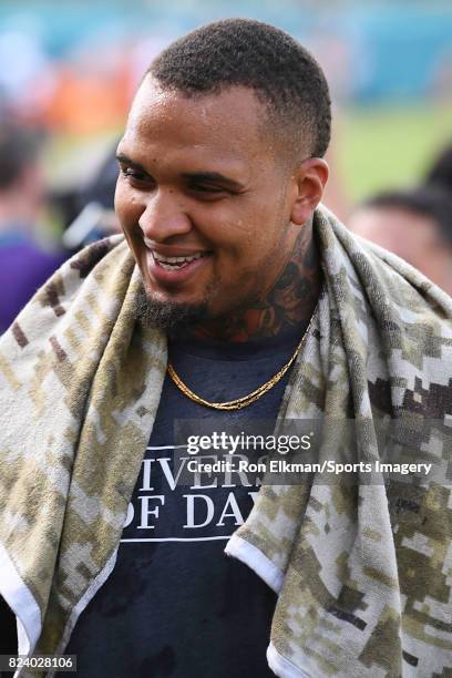 Mike Pouncey of the Miami Dolphins looks on during training camp on July 27, 2017 at the Miami Dolphins training facility in Davie, Florida.