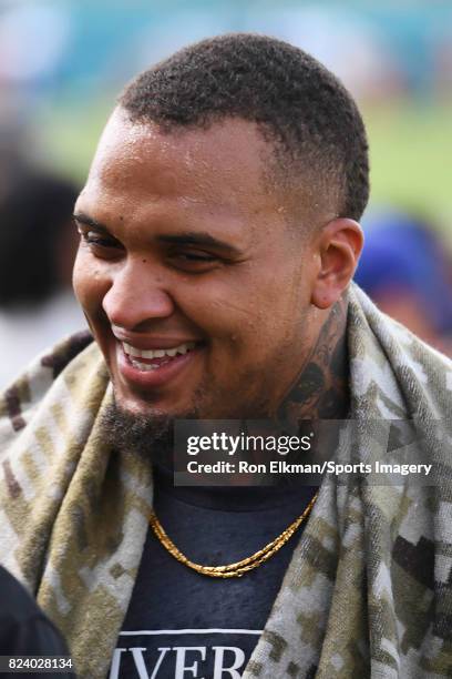 Mike Pouncey of the Miami Dolphins looks on during training camp on July 27, 2017 at the Miami Dolphins training facility in Davie, Florida.