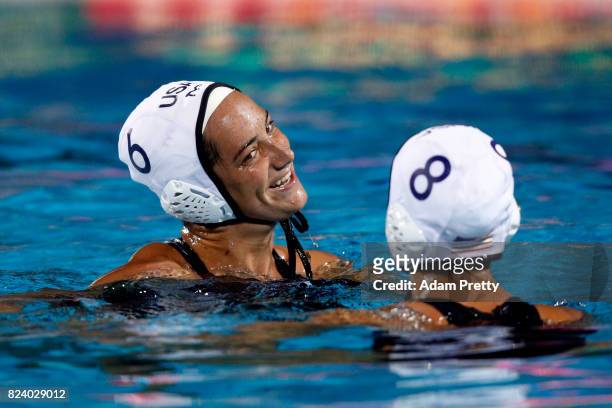 Margaret Steffens of United States and Kiley Neushul of United States celebrate following their team's 13-6 victory during the Women's Water Polo...
