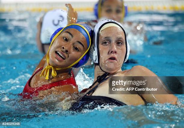 Kiley Neushul fights for the ball with Paula Crespi Barriga of Spain in 'Hajos Alfred' swimming pool of Budapest on July 28, 2017 during the woman...