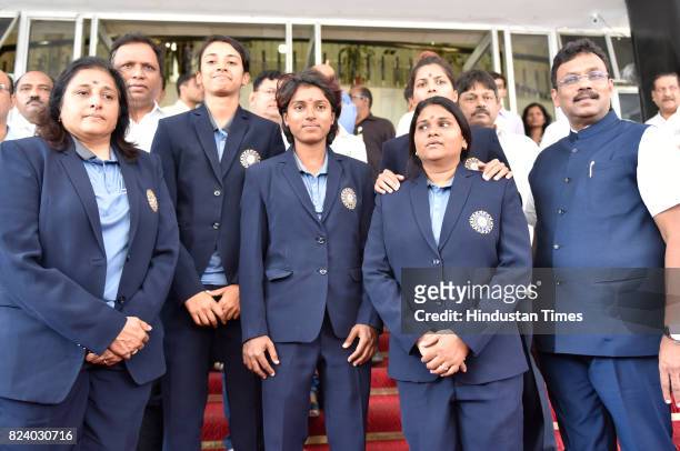 Indian Women Cricket team members – Mona Meshram, Punam Raut and Smriti Mandhana along with support staff at Vidhan Bhavan during the monsoon...