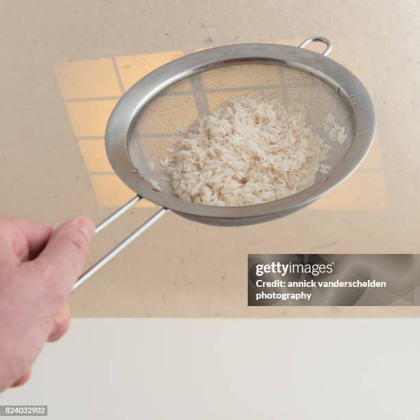 Using A Sieve For Rice 192 Sieving Rice Stock Photos, High-Res Pictures, and Images - Getty Images