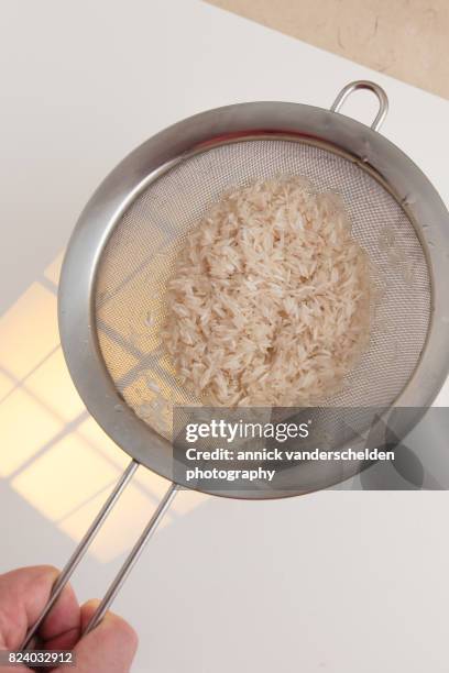 Using A Sieve For Rice 195 Sieving Rice Stock Photos, High-Res Pictures, and Images - Getty Images