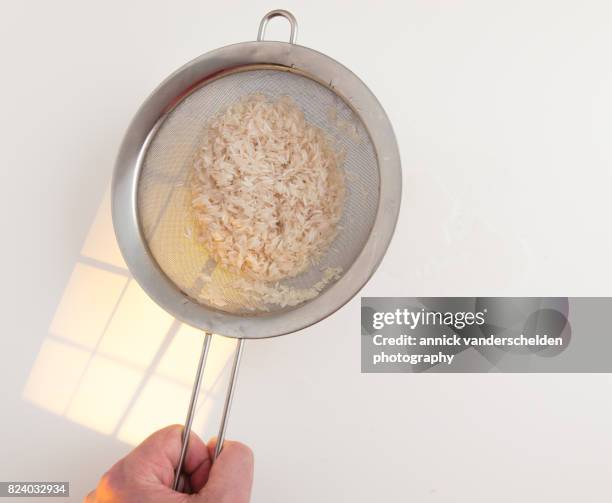 Using A Sieve For Rice 193 Sieving Rice Stock Photos, High-Res Pictures, and Images - Getty Images