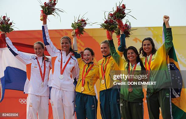 Sailors Silver medalists Marcelien De Koning and Lobke Berkhout of Netherlands, gold medalists Elise Rechichi and Tessa Parkinson of Australia and...