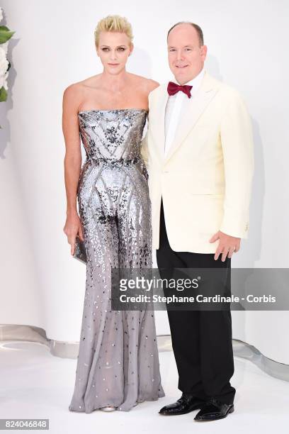 Princess Charlene of Monaco and Prince Albert II of Monaco attend the 69th Monaco Red Cross Ball Gala at Sporting Monte-Carlo on July 28, 2017 in...