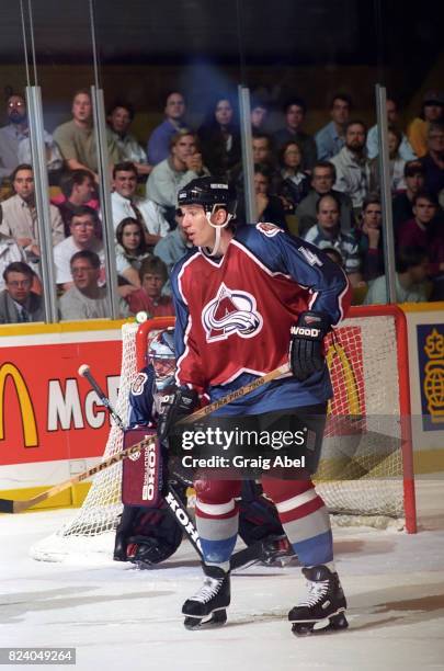 Uwe Krupp of the Colorado Avalanche watches the play against the Toronto Maple Leafs during NHL preseason game action on September 27, 1995 at Maple...