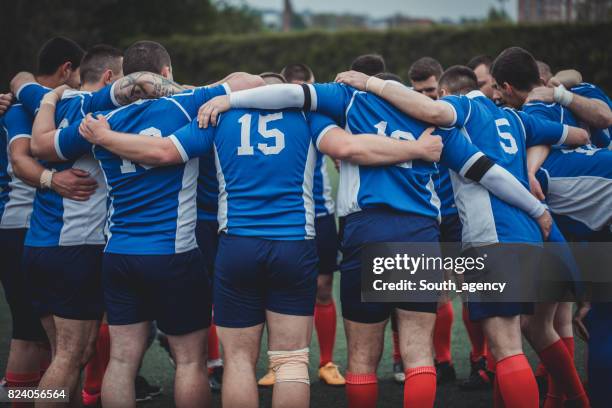 making a strategy to win - rugby scrum stock pictures, royalty-free photos & images