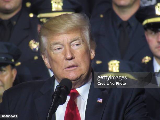 President Donald Trump speaks at Suffolk Community College on July 28, 2017 in Brentwood, New York. Trump, speaking close to where the violent street...