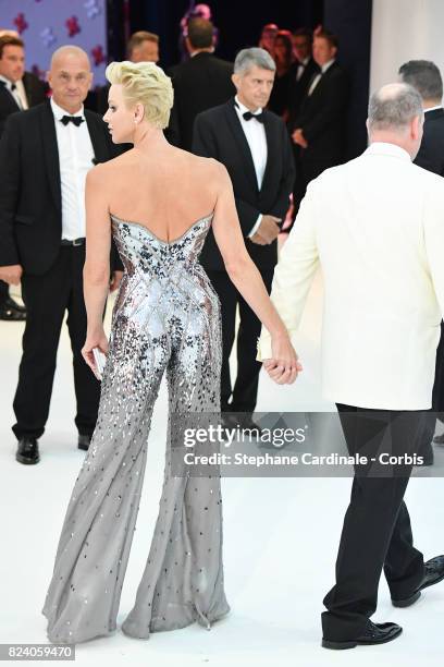 Princess Charlene of Monaco and Prince Albert II of Monaco attend the 69th Monaco Red Cross Ball Gala at Sporting Monte-Carlo on July 28, 2017 in...