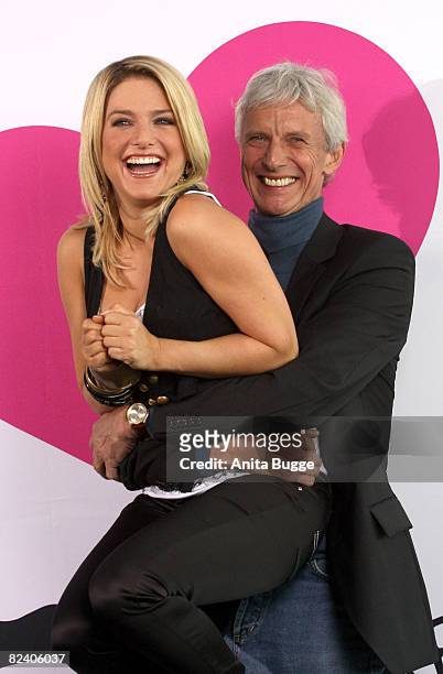 Actress and singer Jeanette Biedermann and actor Mathieu Carriere attend a photocall to the new German television SAT.1 telenovela 'Anna und die...