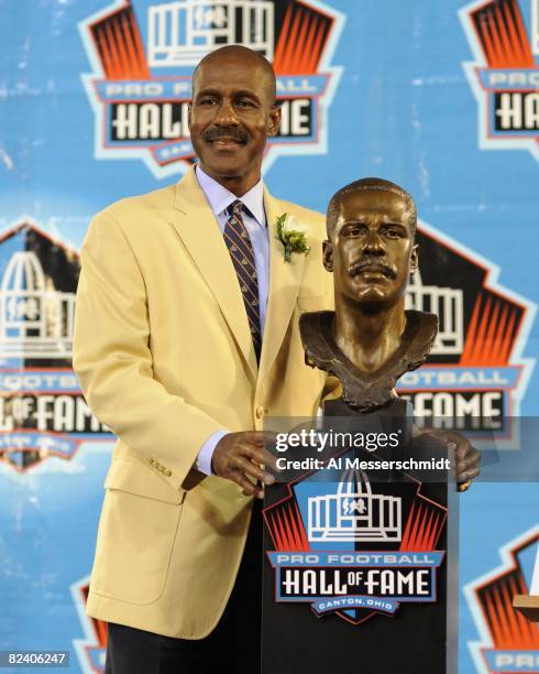 Art Monk of the Washington Redskins, poses with his bust during the Class of 2008 Pro Football Hall of Fame Enshrinement Ceremony at Fawcett Stadium...