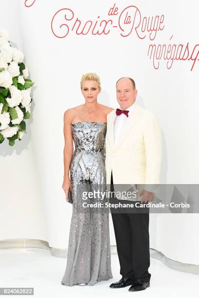 Princess Charlene of Monaco and Prince Albert II of Monaco attend the 69th Monaco Red Cross Ball Gala at Sporting Monte-Carlo on July 28, 2017 in...