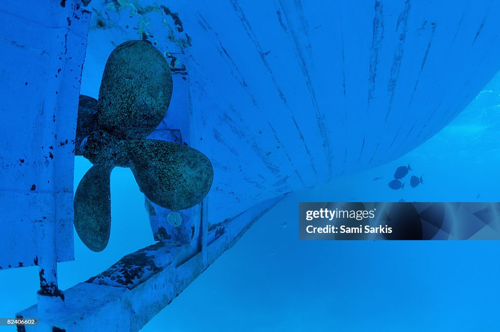 Ship propeller and hull, underwater view