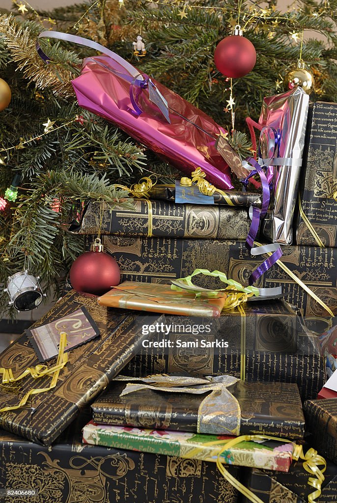 Gifts under Christmas tree, close-up