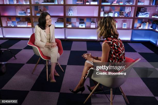 Sheryl Sandberg, chief operating officer of Facebook Inc., smiles during a Bloomberg Studio 1.0 television interview at Facebook headquarters in...