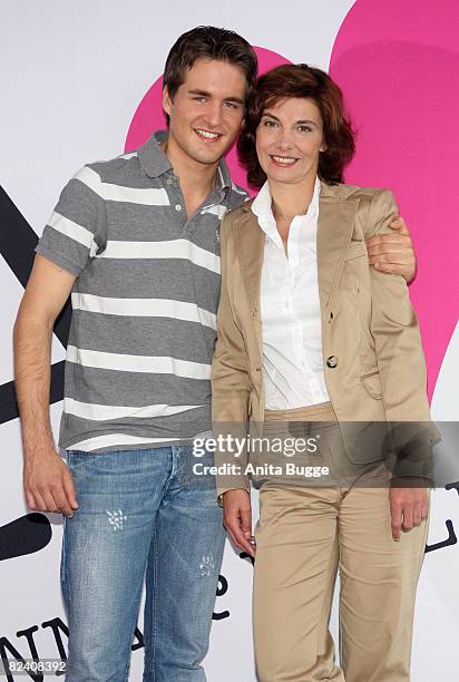 Actor Alexander Klaws and actress Karin Kienzer attend a photocall to the new German television SAT.1 telenovela 'Anna und die Liebe' on August 18,...