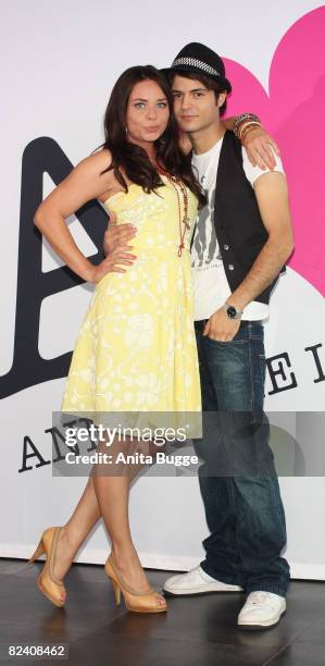 Actress Maja Maneiro and actor Sebastian Koenig attend a photocall to the new German television SAT.1 telenovela 'Anna und die Liebe' on August 18,...