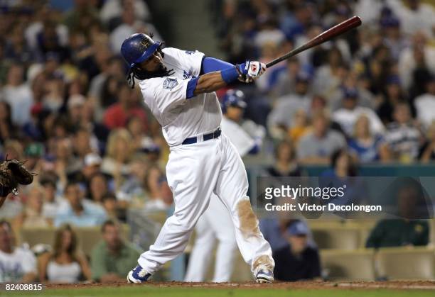 Manny Ramirez of the Los Angeles Dodgers bats during their MLB game against the Milwaukee Brewers at Dodger Stadium on August 16, 2008 in Los...