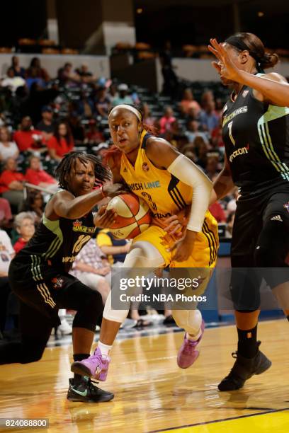 Tiffany Mitchell of the Indiana Fever handles the ball against the New York Liberty on July 28, 2017 at Bankers Life Fieldhouse in Indianapolis,...