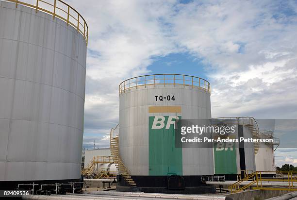 Petrobras oil storage tanks stand at an oil refinery on June 3, 2008 in Manuas, Brazil. Petrobras is a semi-public Brazilian Energy Company that...