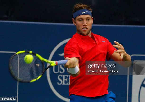 Jack Sock returns a forehand to Kyle Edmund of Great Britain during the BB&T Atlanta Open at Atlantic Station on July 28, 2017 in Atlanta, Georgia.