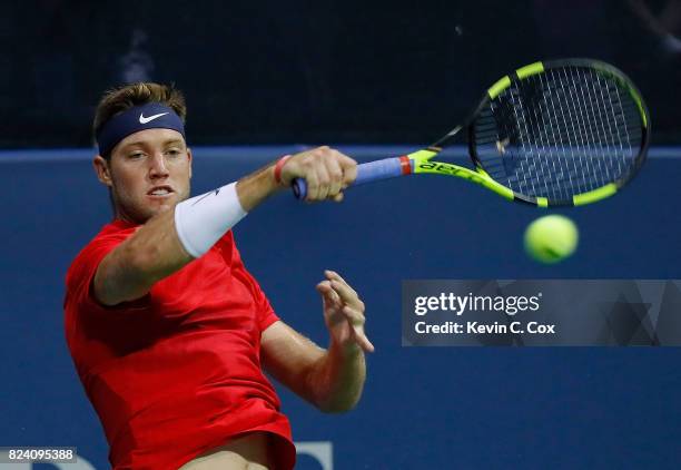 Jack Sock returns a forehand to Kyle Edmund of Great Britain during the BB&T Atlanta Open at Atlantic Station on July 28, 2017 in Atlanta, Georgia.