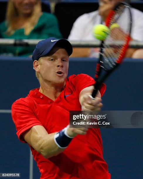 Kyle Edmund of Great Britain returns a backhand to Jack Sock during the BB&T Atlanta Open at Atlantic Station on July 28, 2017 in Atlanta, Georgia.